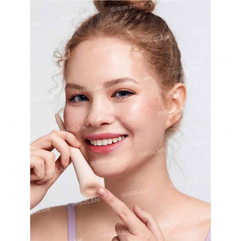 Brush applying foundation on model skin natural even finish clearly visible without lines creates flawless coverage for professional makeup Sheglam