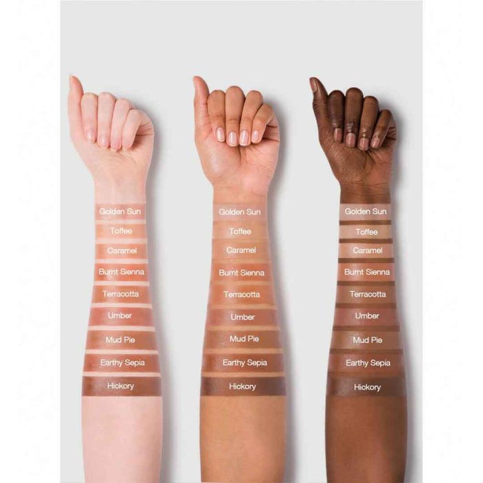Close-up of Golden Sun liquid contour texture on hand skin; lightweight creamy texture with medium brown warm undertone, ideal for natural highlighting and warming the face without harsh lines