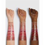 Closeup of soft velvety texture of Memory lip tint on skin rich warm natural matte smooth light coverage comfortable sheglam