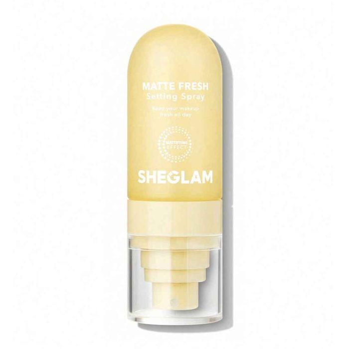 Compact spray bottle 55ml with matte white body and minimal design featuring Sheglam logo secure cap ideal for daily use or carrying in makeup bag Sheglam