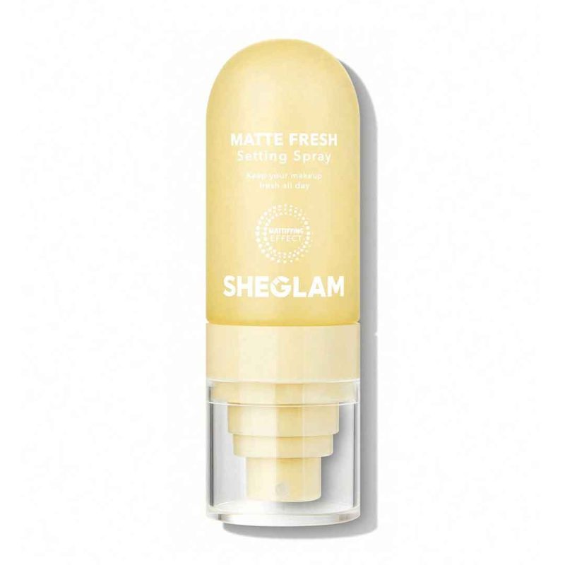 Compact spray bottle 55ml with matte white body and minimal design featuring Sheglam logo secure cap ideal for daily use or carrying in makeup bag Sheglam
