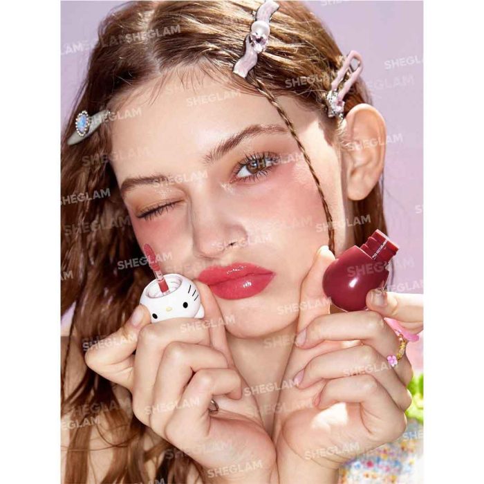 Model’s lips after applying Hello Kitty pot shine ,clear, glossy, and plump with a natural, soft finish, emphasizing lip texture without heaviness Sheglam