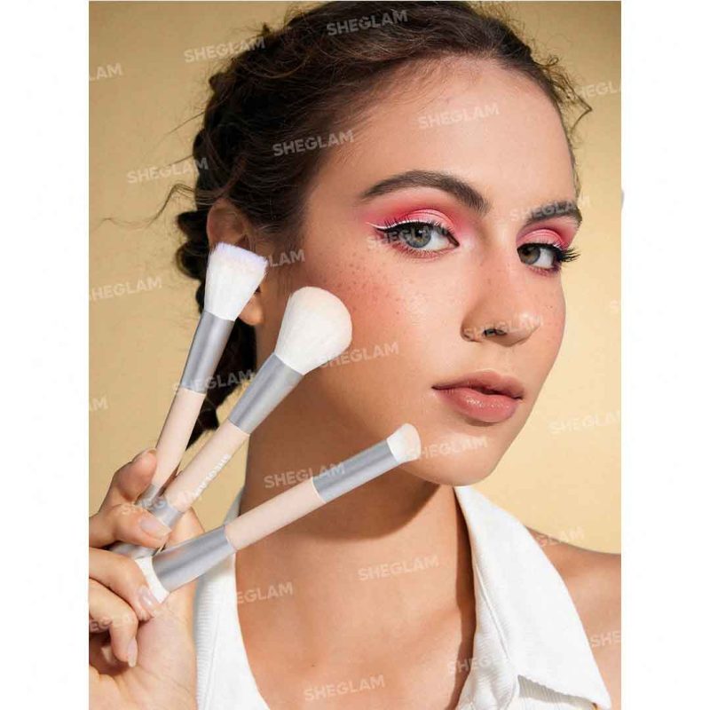 View of brushes applying makeup on model’s face precise even blending of various makeup products natural flawless finish suitable for all skin types Sheglam